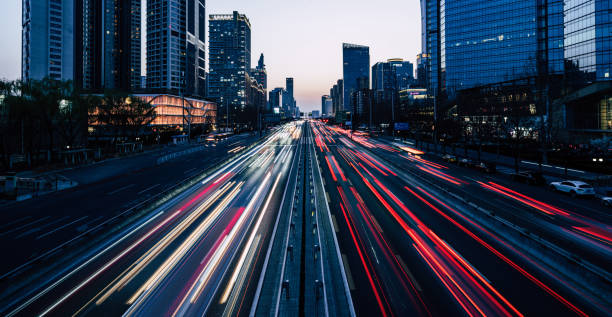 istock Traffic moving in both directions at dusk 1405004506