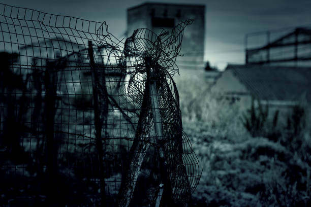 Shattered metal fence
