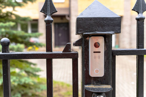 istock intercom panel with a video camera on the brick fence of private house 1405016694