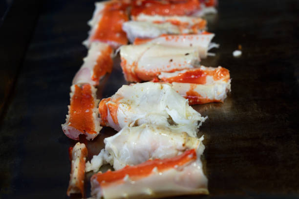 istock Crab legs sea food on black background 1405019852