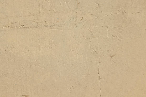 istock Part of a textured beige wall 1405021379