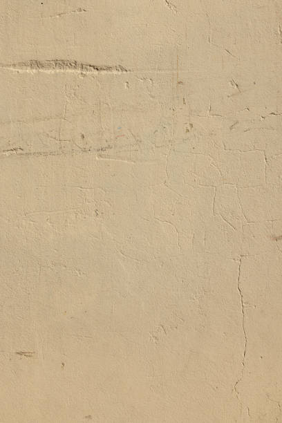 istock Part of a textured beige wall 1405021380