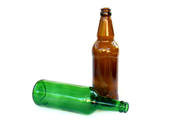 istock Empty beer bottles in green and brown on a white background isolated. 1405029569