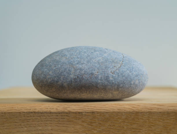 istock light gray zen stone  oval shape on a white background stand base podium for background 1405031110