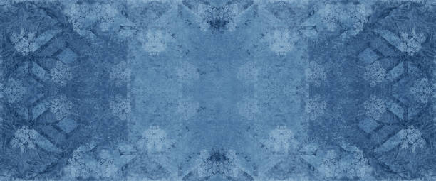 istock Blue old aged worn cement concrete stone tile wall wallpaper texture, with floral flower rhombus rue diamond square print, shabby vintage retro background banner panorama 1405034768