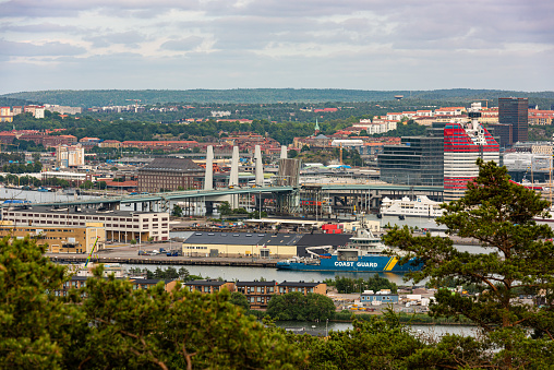 Gothenburg, Sweden - June 27 2021: The newly opened Hisingsbron and the old Göta Älvbron being dismantled.