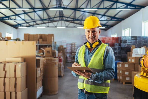 istock Portrait of a smiling warehouse worker 1405039811