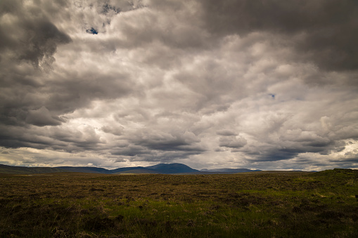 A cloudy summer HDR image of appraoching bad weather over Mackay Country, Sutherland, Scotland