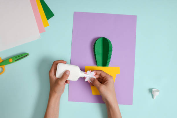 istock DIY. A postcard with a cactus in a pot. Step-by-step photo instruction. 1405040677