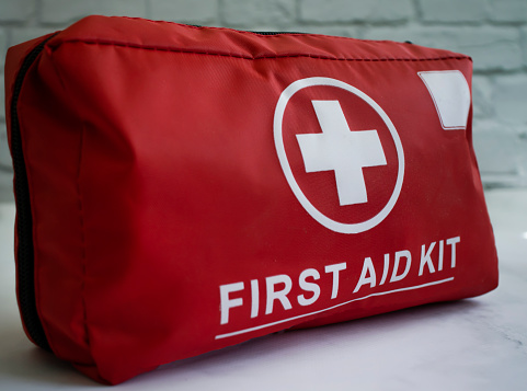 First aid kit on a light background