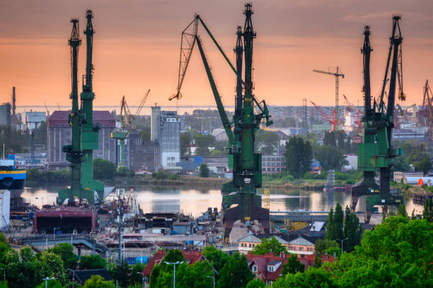 istock Shipyard cranes in Gdansk at sunset. Poland 1405047817