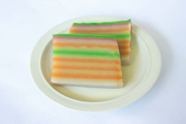 istock lapis cake or roti lapis or layer cake or lapis legit served in little plate isolated on white background made from rice flour, starch, coconut milk, sugar, salt and coloring 1405048890