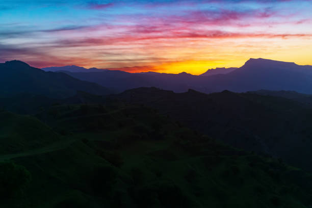sunset in the mountains, evening landscape with bright sky