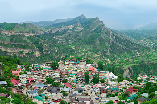 mountain town in a misty valley among impressive mountains, Gunib village in Dagestan