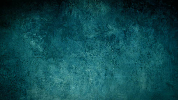 istock Abstract turquoise color colored painted watercolor stone concrete paper texture background, with dark vignette, top view 1405054507