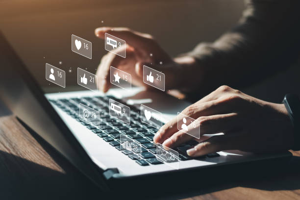 istock businessman Are working on the laptop keyboard to use the search engine optimization tool. 1405056376