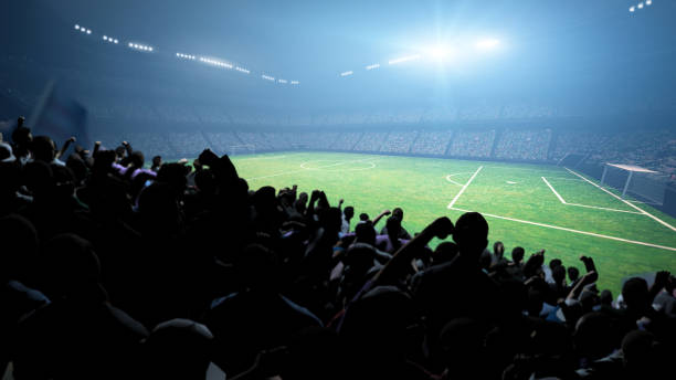 istock Silhouette of people in the stadium at night. 1405058027