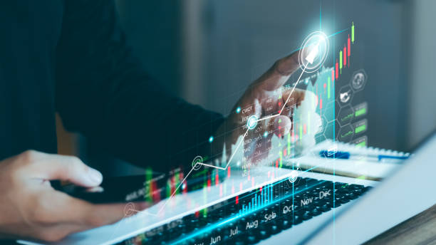 istock Businessman Use a laptop to analyze sales data and graph economic growth. 1405058108