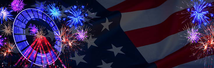 4th of July, Independence Day, Memorial Day, Veteran's Day Holiday Summer festival party event background banner panorama - Ferris wheel in motion, waving American flag and colorful fireworks at night
