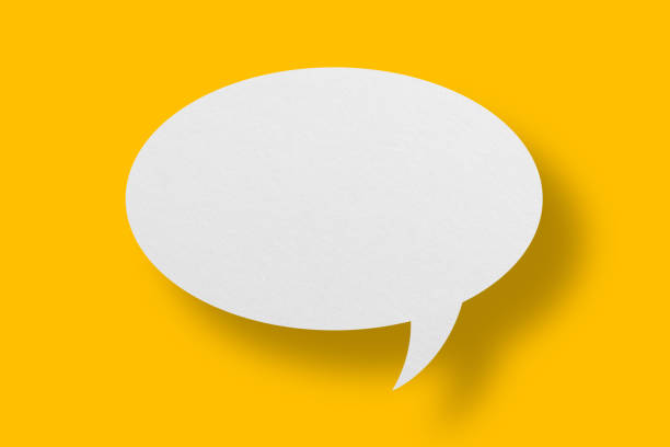 istock White paper in speech bubble shape set against yellow background. 1405059774