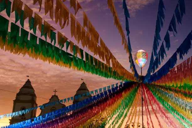 Photo of colorful flags and decorative balloon of the festa junina in Brazil