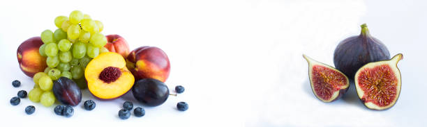 istock Banner. Close-up on fruit and berry on the white background. 1405062878