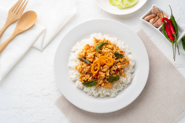 istock Rice topped with stir-fried minced chicken and basil 1405070329