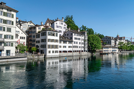 Historical houses and facades along the famous Limmatquai in the old town of Zurich, Switzerland