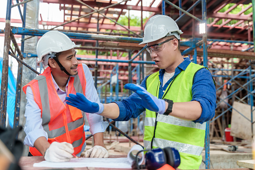 Constructer Working Teamwork Of Asian Constructor Engineer Working And Discussing On ...