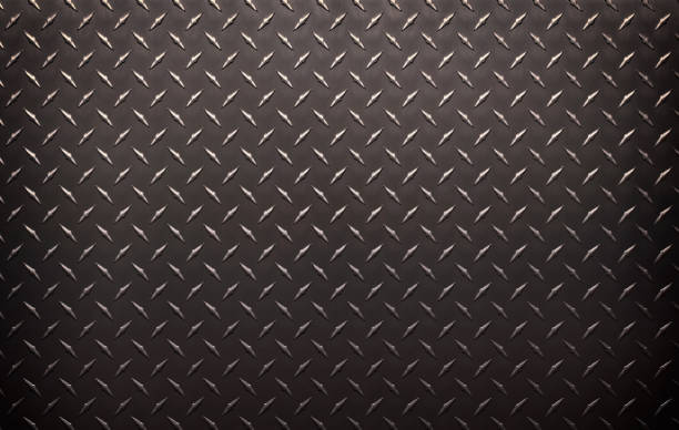 istock black metal background. iron sheet with a diamond texture. 1405087962