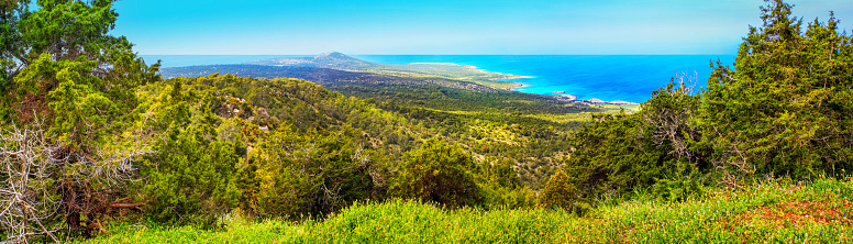 Mediterranean landscape, panorama, banner - top view from the mountain range to the Karpas Peninsula, northeastern part of the island of Cyprus