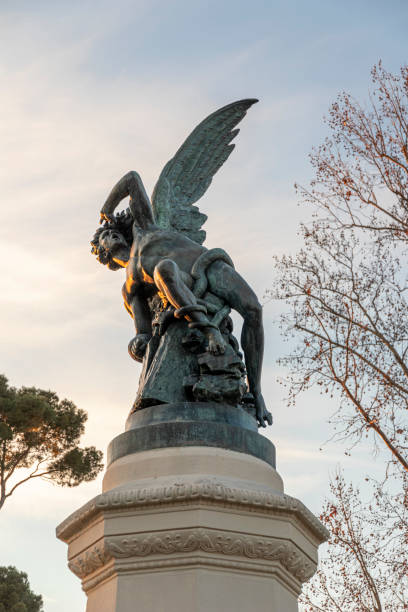 Madrid, Spain. The Fuente del Angel Caido (Monument of the Fallen Angel), a fountain located in the Buen Retiro Park
