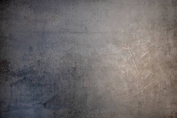 istock Dark gray concrete wall texture. Design on cement and concrete textures for the background. 1405099832