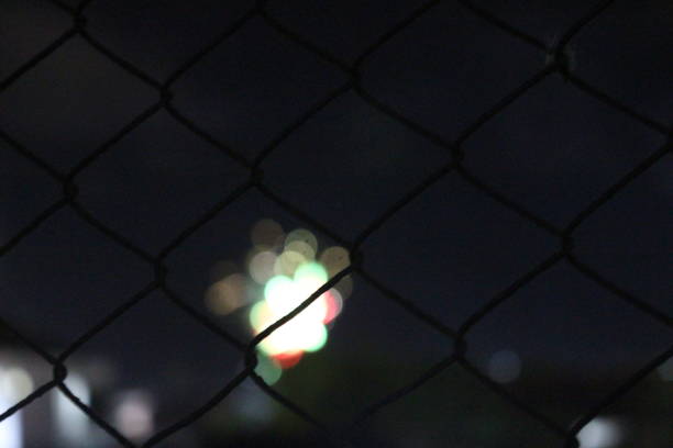 istock Wire fence and city life 1405100074