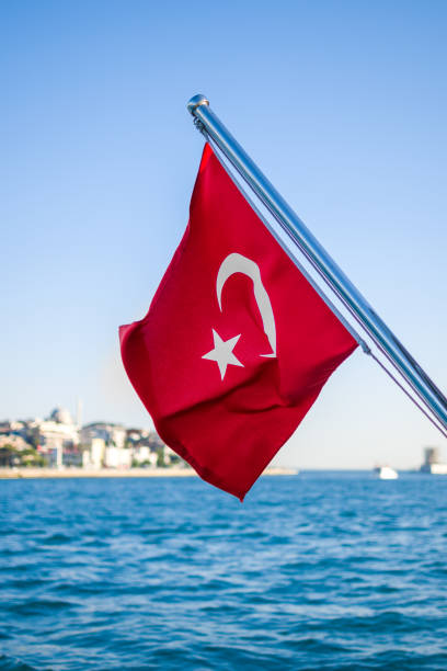 istock Turkish flag to Bosphorus, Istanbul 1405106272