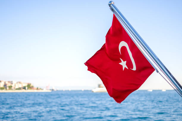 istock Turkish flag to Bosphorus, Istanbul 1405106831