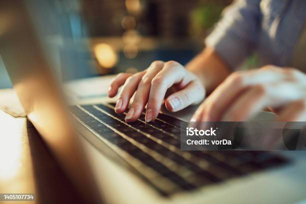 Woman Using A Laptop At Home Stock Photo - Download Image Now - Computer Keyboard, Typing, E-Mail