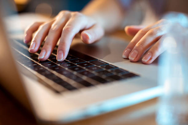 istock Woman using a Laptop at home 1405107749