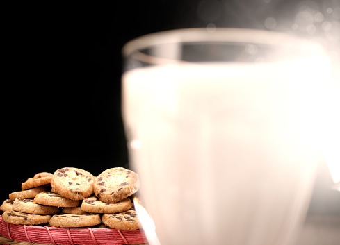 chocolate chip cookies served with  cup of coffee