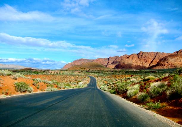 Road to Ivins in the Mojave Desert Take the Old Highway 91 to Ivins, a desert community outside St. George. It is near Tuacahn (an outdoor arts and amphitheater) and is in close proximity to Snow Canyon State Park, Utah. snow canyon state park stock pictures, royalty-free photos & images