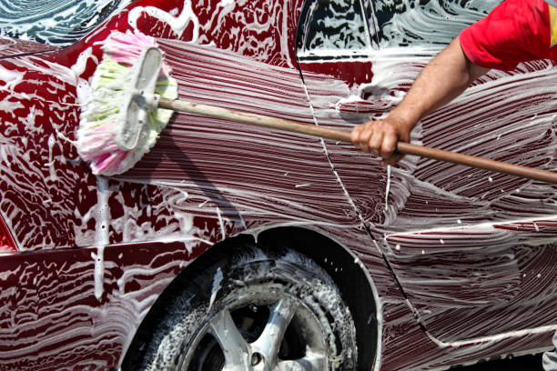 istock Close up car washing cleaning brush 1405110573