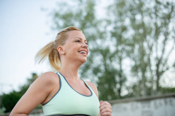 istock A woman maintains perfect shape by exercising 1405110732