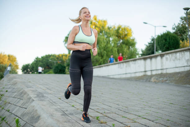 istock Woman enjoys exercising 1405110743
