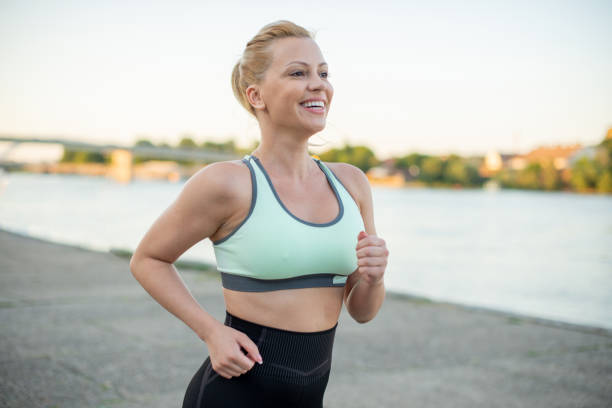 istock A woman maintains perfect shape by exercising 1405110748