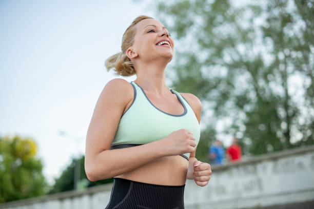 istock A woman maintains perfect shape by exercising 1405110751