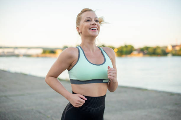 istock Woman enjoys exercising 1405110774