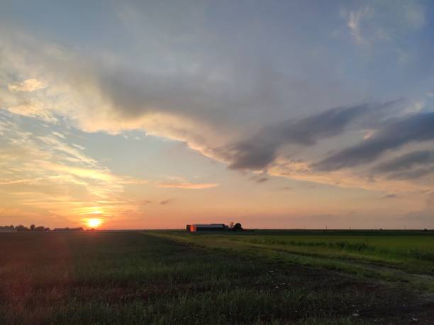 istock Farm on the Plains during sunset 1405111035