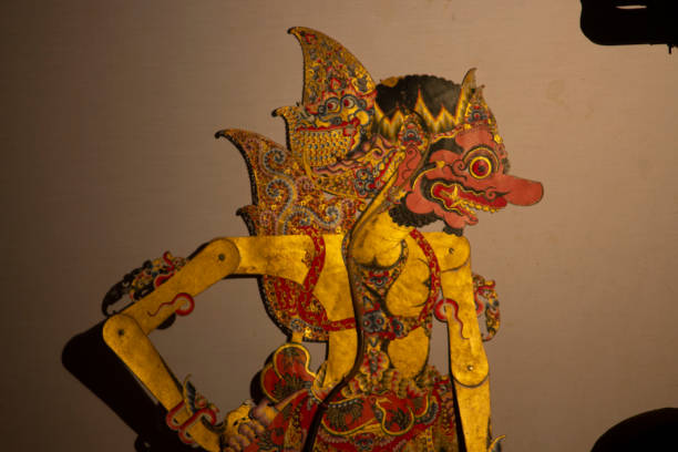 istock wayang kulit or shadow puppets from Java, Indonesia puppet show by dalang or puppeteer . Wayang made from leather 1405118313