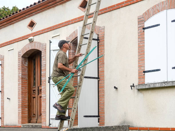 istock Roof work to clean the chimney. 1405120698