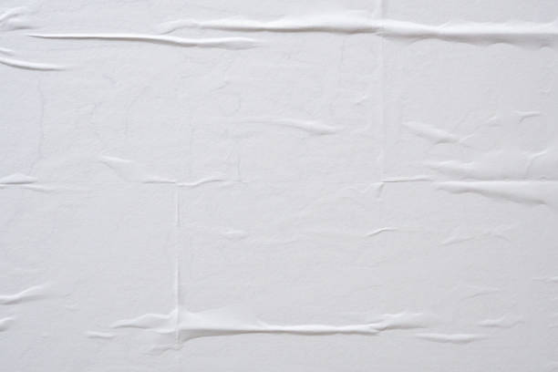 istock white crumpled and creased paper poster texture background 1405128323